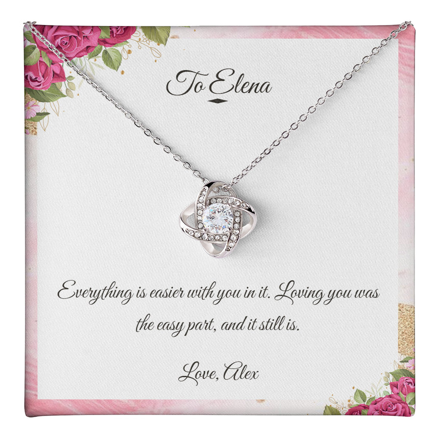 Love Knot Necklace lying on a personalised message card addressed to Elena.