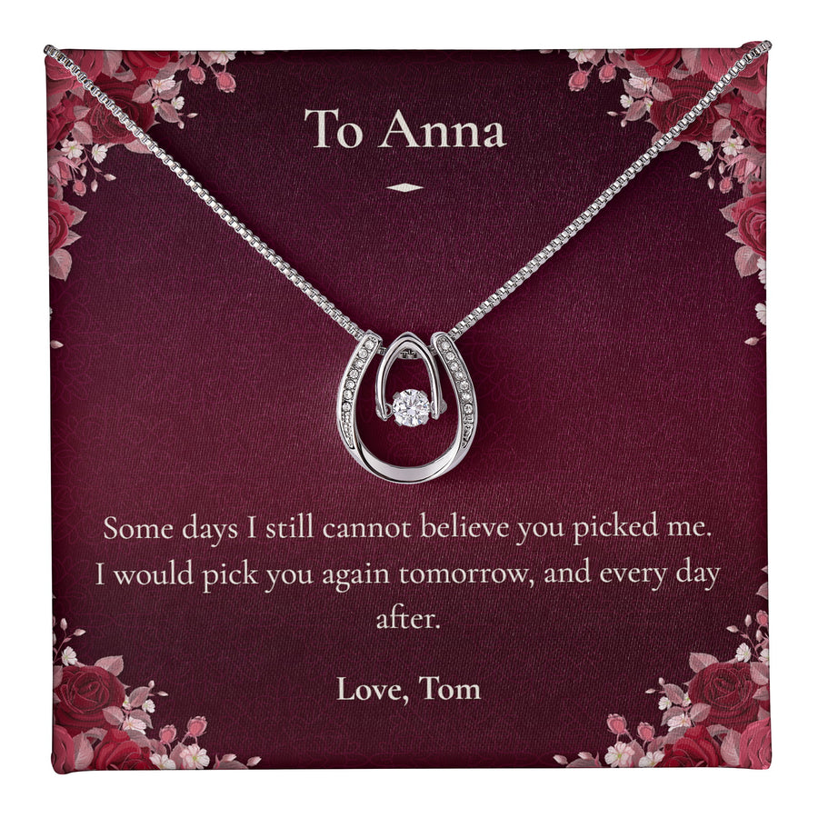 Lucky in Love Necklace lying on a personalised message card addressed to Anna.